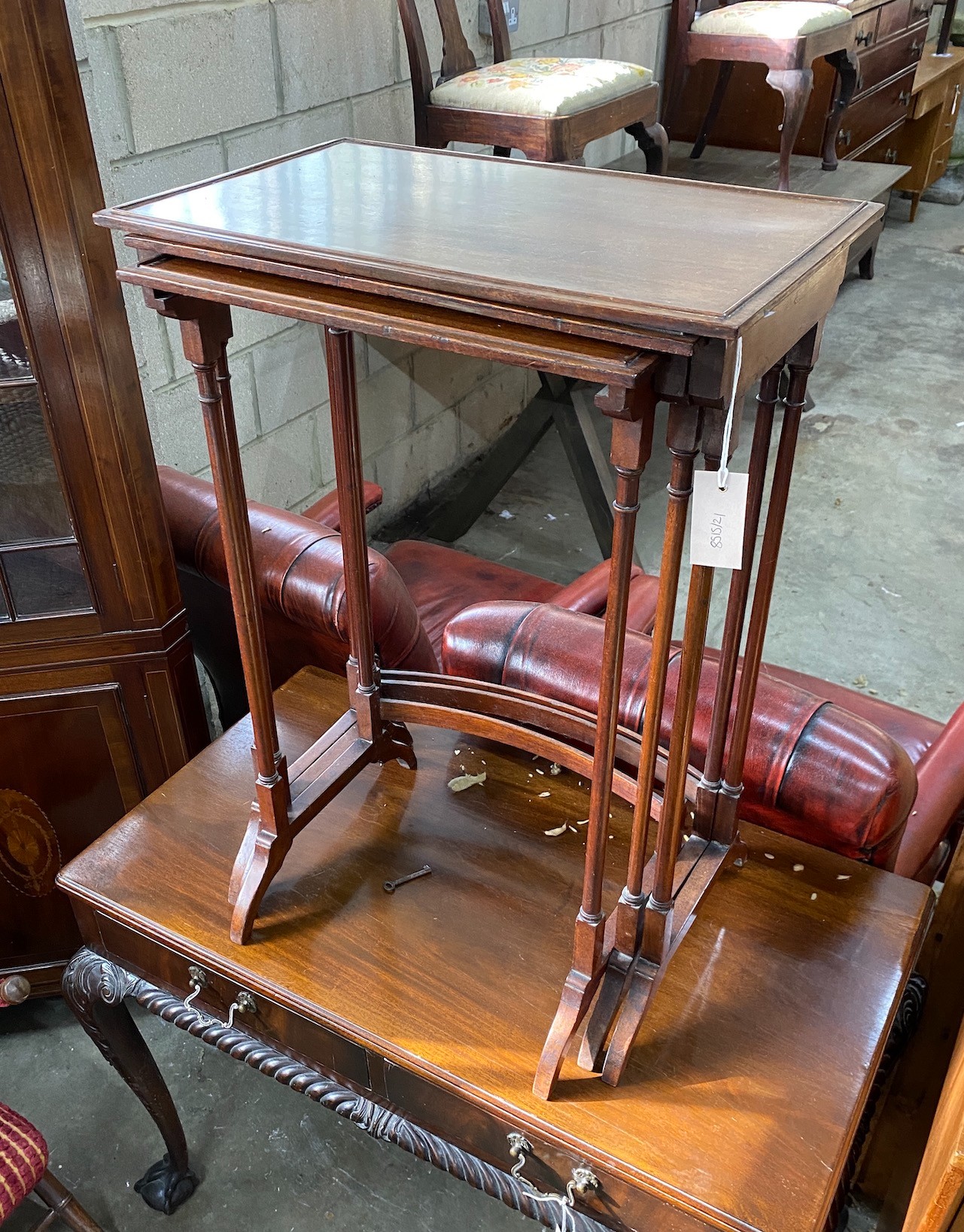 A nest of three Edwardian rectangular mahogany tea tables, width 51cm, depth 32cm, height 72cm